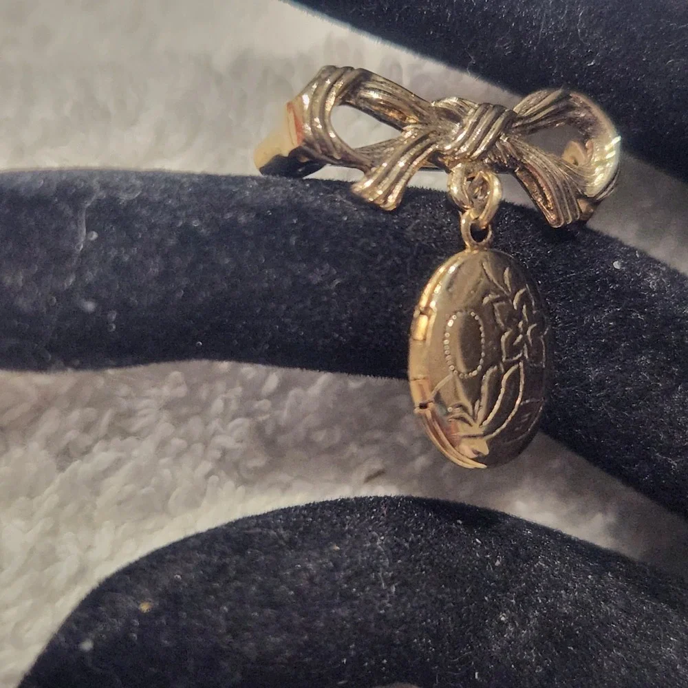 Vintage Gold Tone Bow Brooch with Engraved Floral Oval Dangle Locket Pin